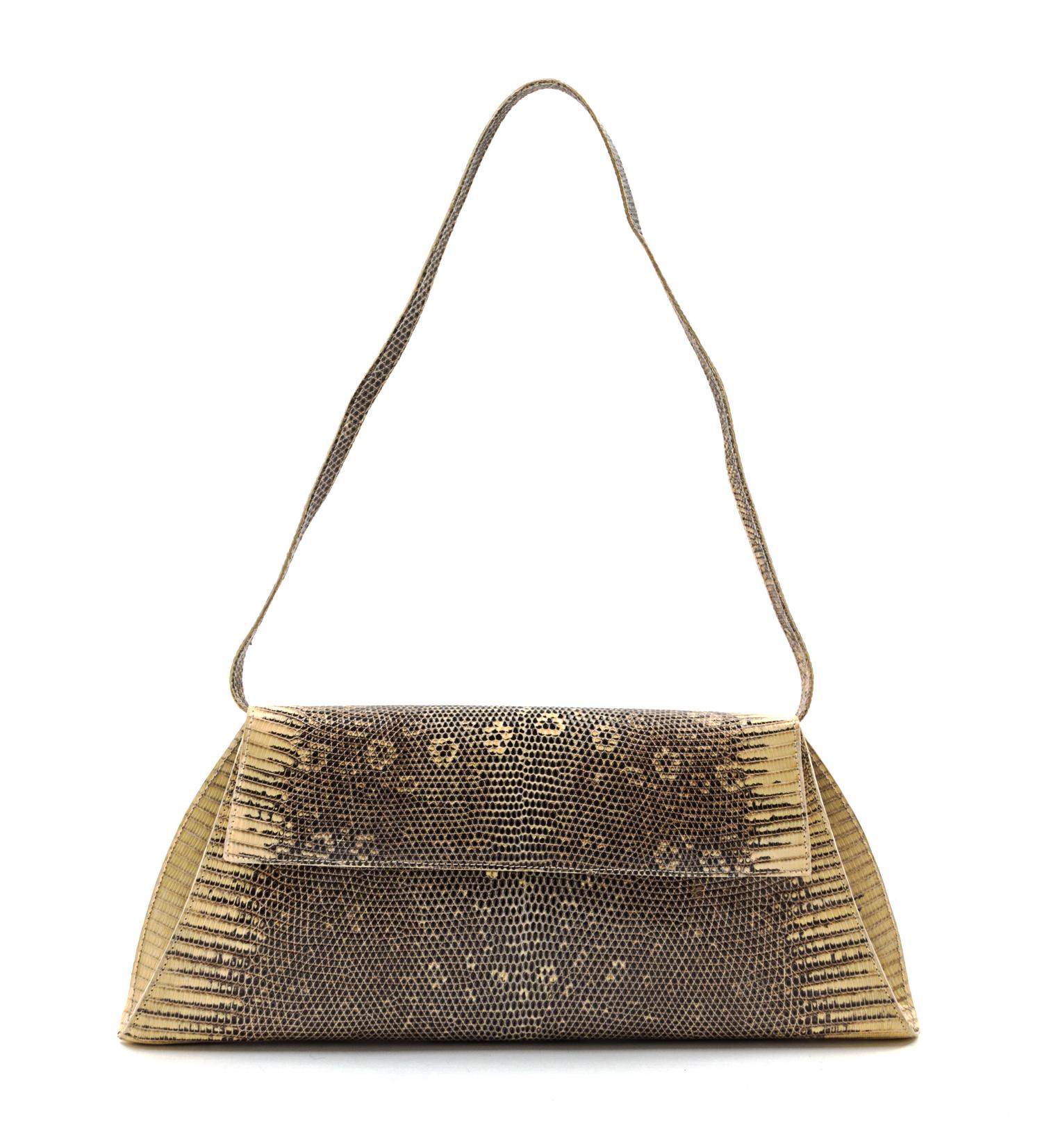 A Nancy Gonzalez Cream Lizardskin Convertible Clutch, 11 1/2 x 5 x 1 inches.