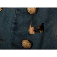 A collection of items identified to Lieutenant Colonel Jonathan Biggs, 123rd Illinois Infantry, “Wilder’s Brigade,” highlighted by bullet-struck frock coat and vest worn during the assault on Selma, Alabama. 2 April 1865.
