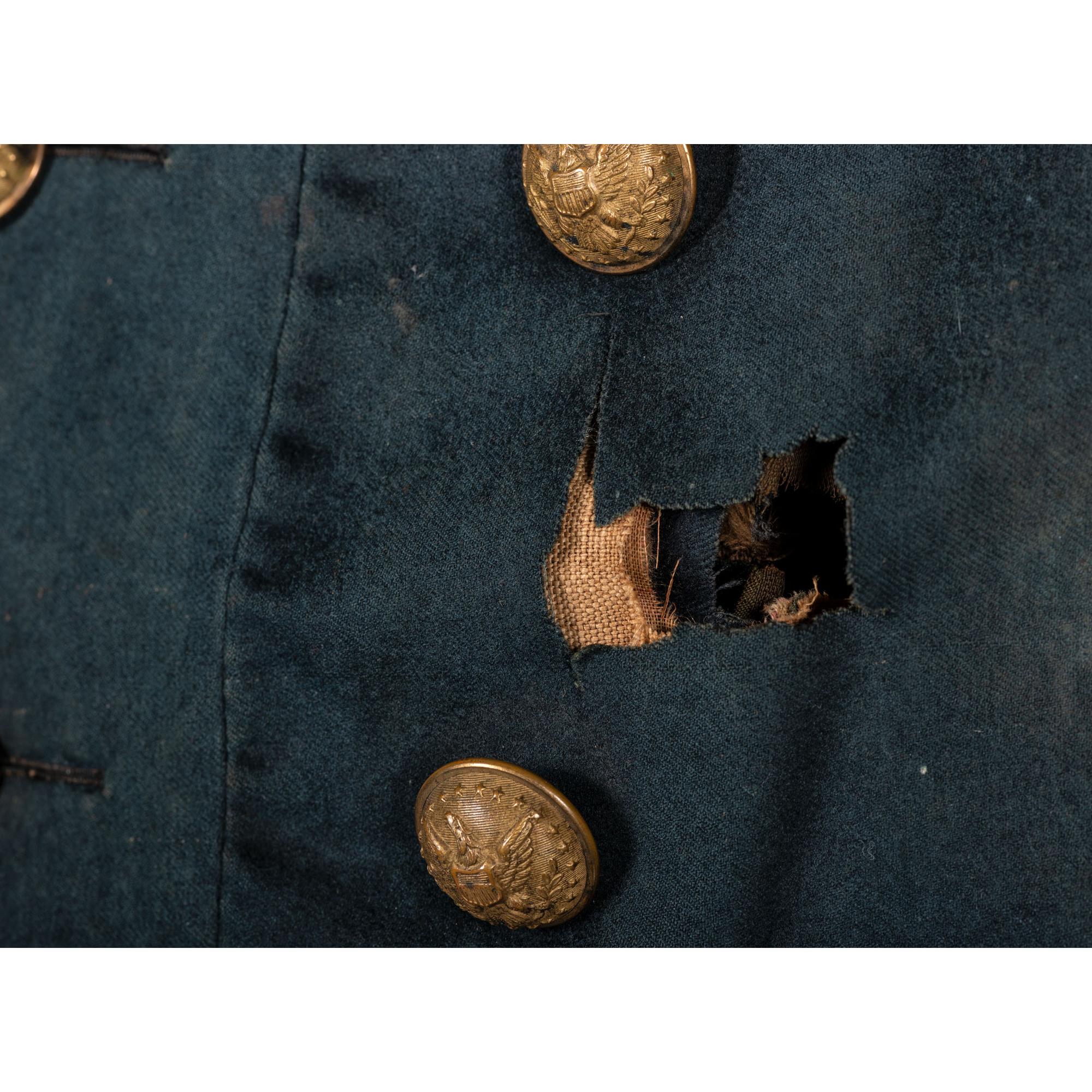 A collection of items identified to Lieutenant Colonel Jonathan Biggs, 123rd Illinois Infantry, “Wilder’s Brigade,” highlighted by bullet-struck frock coat and vest worn during the assault on Selma, Alabama. 2 April 1865.