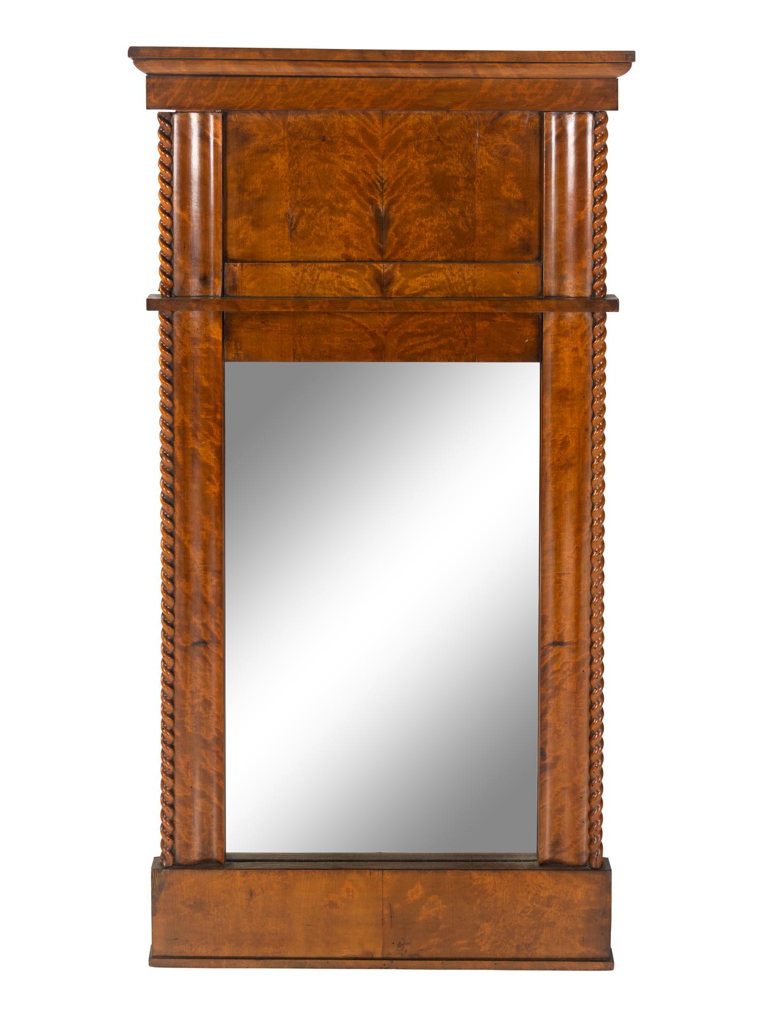 A Biedermeier Figured Veneer Mirror