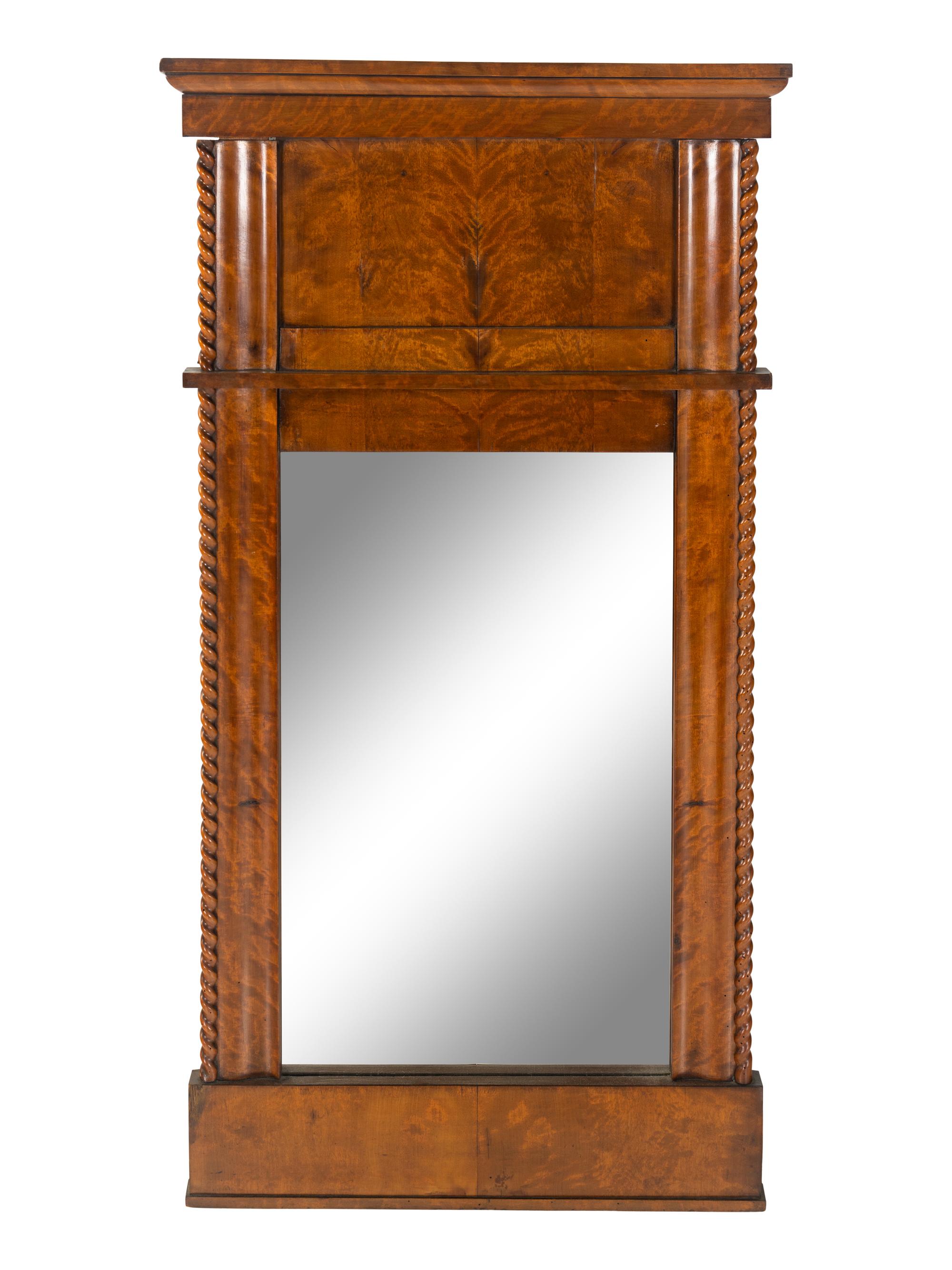 A Biedermeier Figured Veneer Mirror