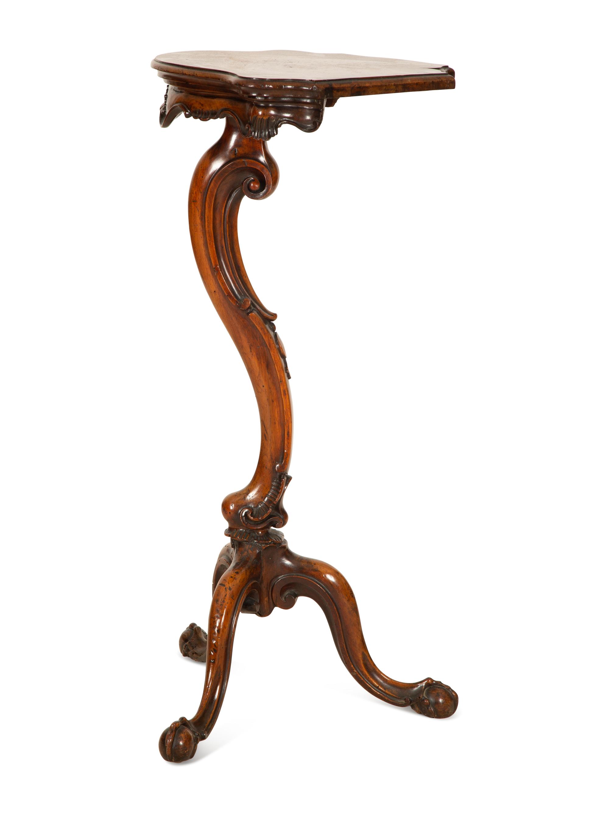 An Italian Rococo Carved Walnut Tripod Stand
