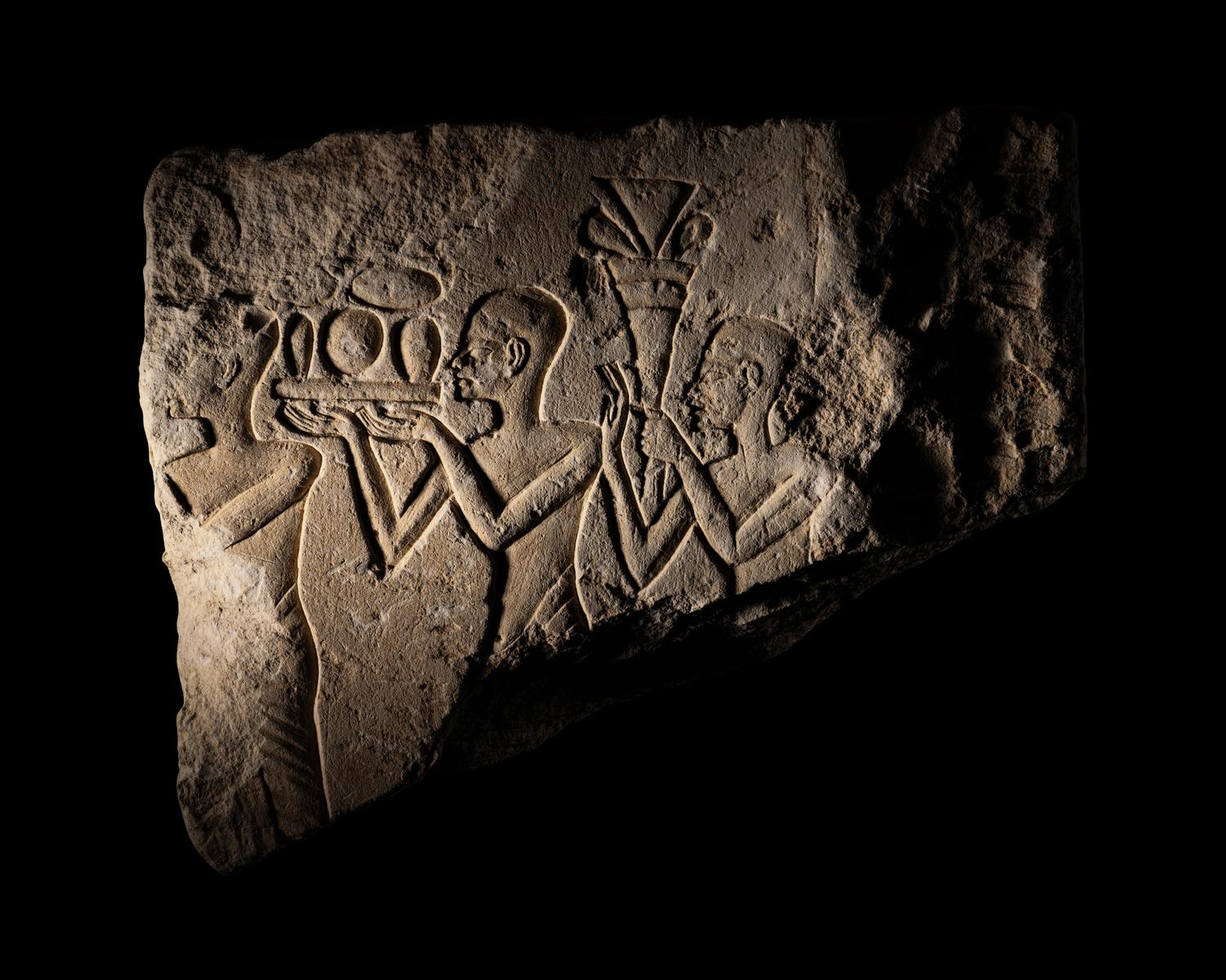 An Egyptian Limestone Relief Fragment