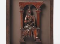A carved architectural element of an American Indian with a Pipe, South Carolina, 19th century