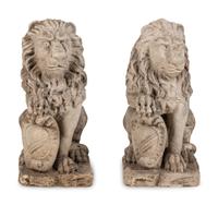 A Pair of Cast Stone Lion Figures