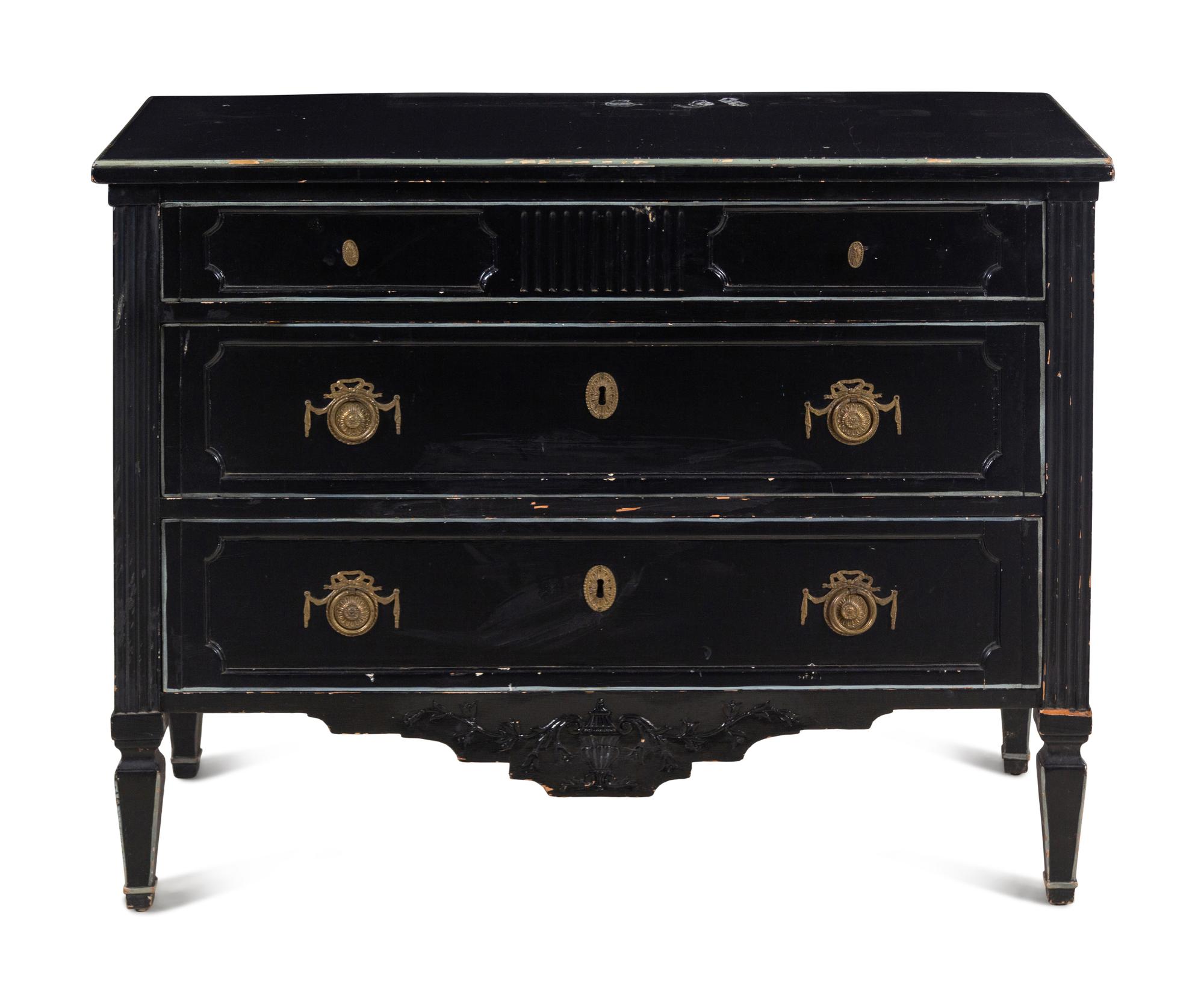 An Italian Gilt Metal Mounted Ebonized Chest of Drawers