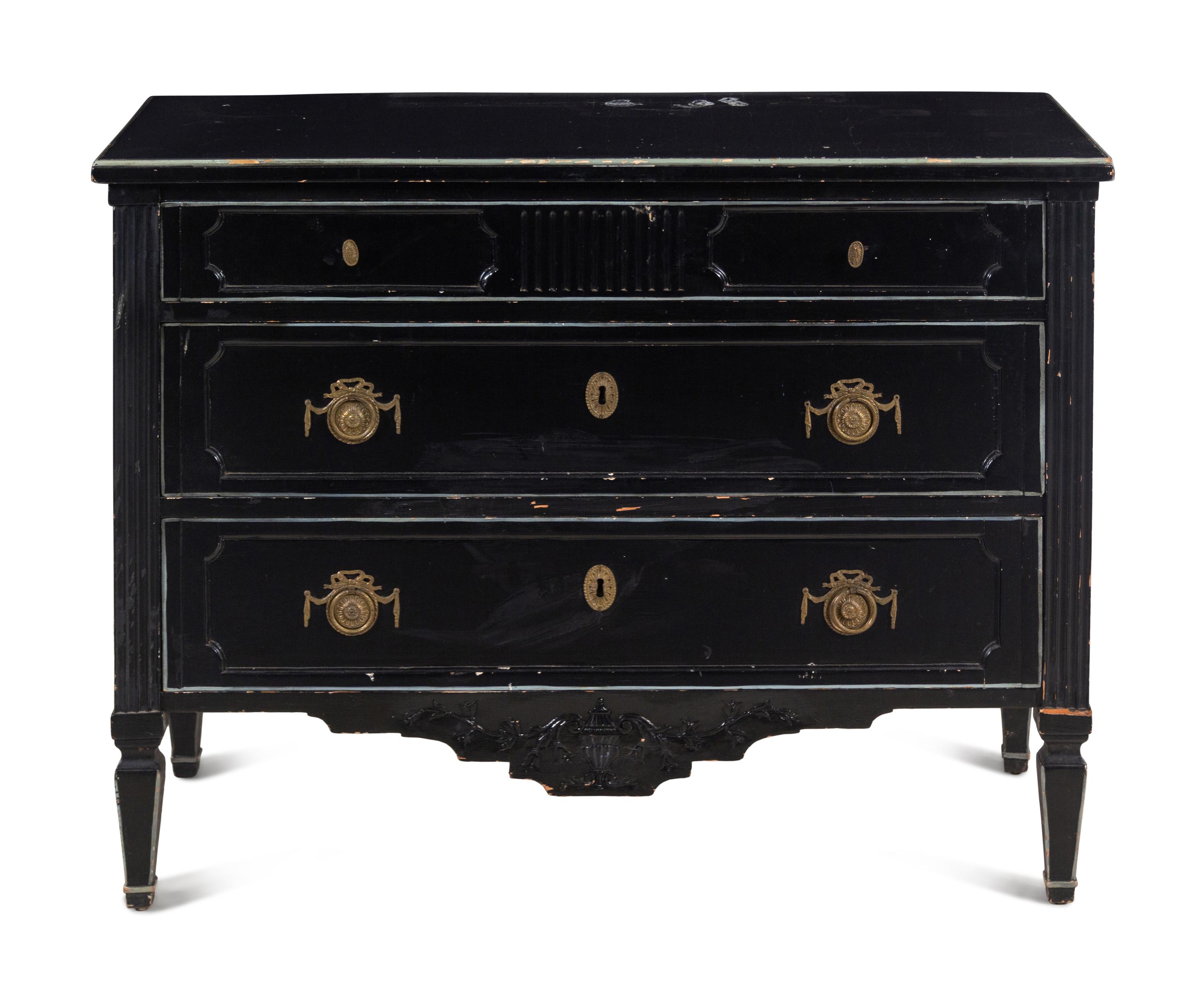 An Italian Gilt Metal Mounted Ebonized Chest of Drawers