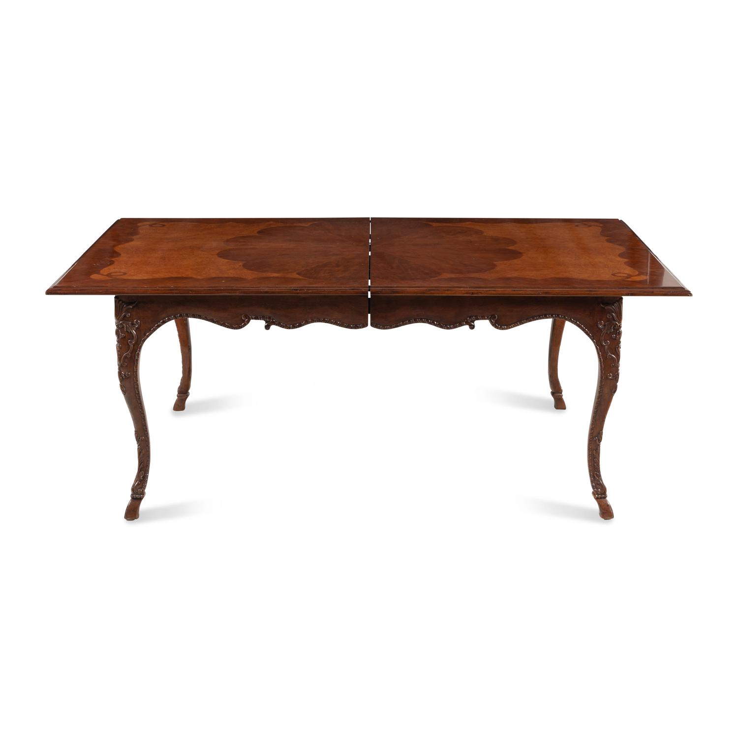A Baker Mahogany and Burl Walnut Dining Table
