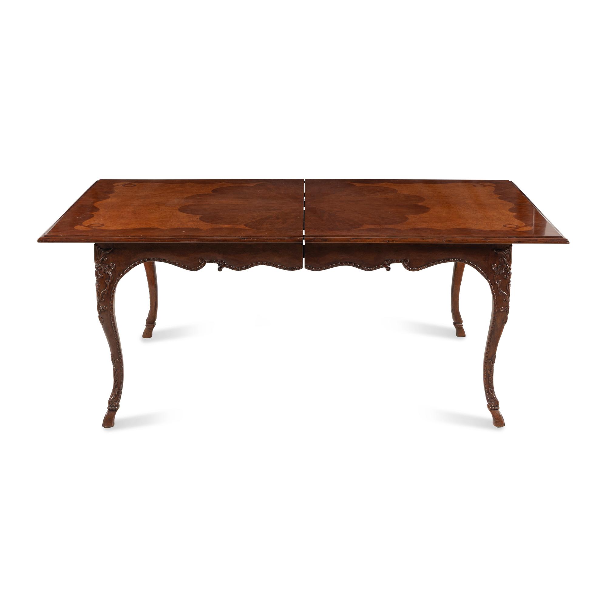 A Baker Mahogany and Burl Walnut Dining Table