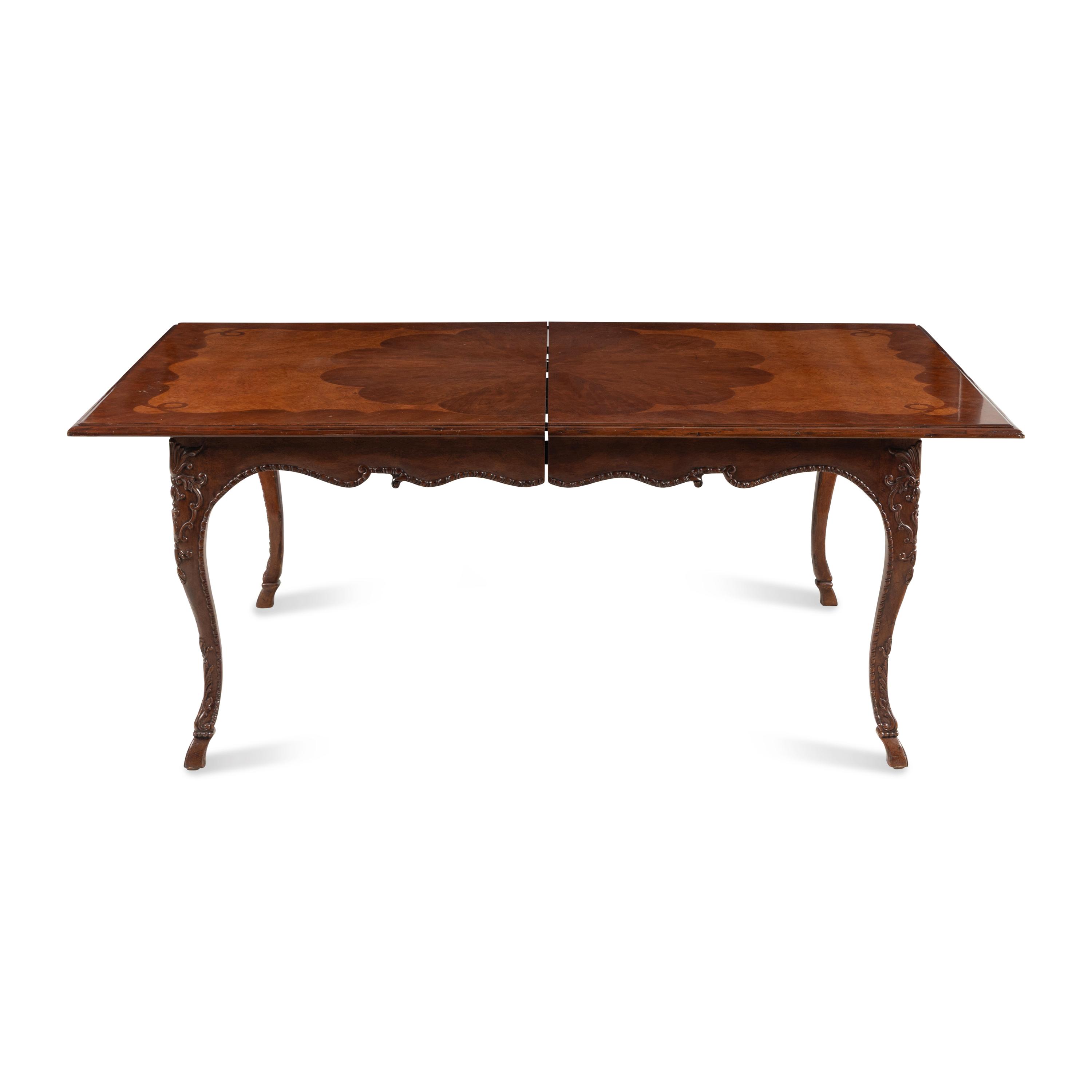 A Baker Mahogany and Burl Walnut Dining Table
