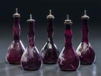Five 'Mary Gregory' Enameled Amethyst Barber Bottles