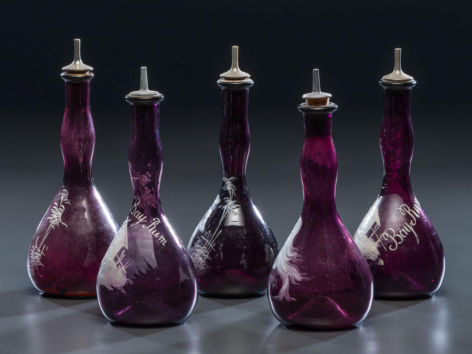 Five 'Mary Gregory' Enameled Amethyst Barber Bottles