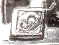 A Pair of 18 Karat White Gold, Diamond and Ruby Earclips, H. Stern,