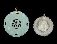 Two Chinese Carved Jade Floriform Pendants