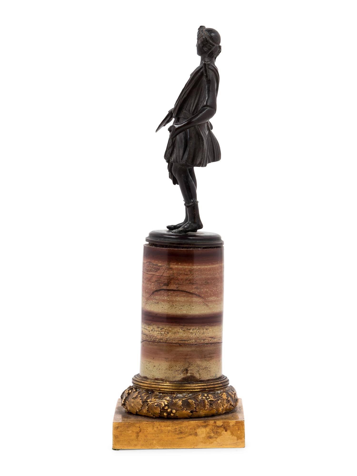 A Grand Tour Bronze Figure on a Marble Base