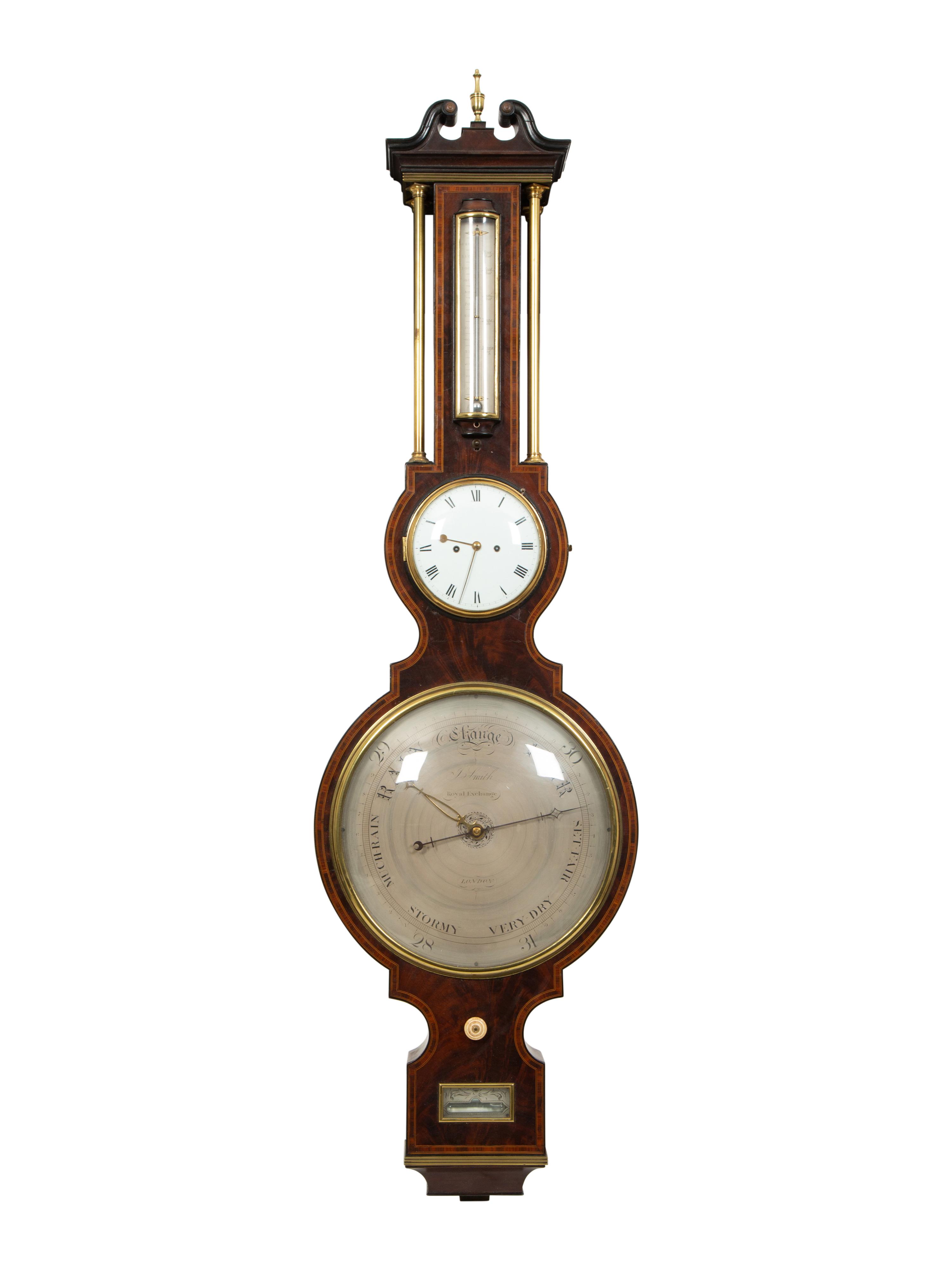 A Regency Crossbanded Mahogany Repeating Clock and Barometer