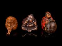 Three Japanese Carved Boxwood Figural-Form Netsuke