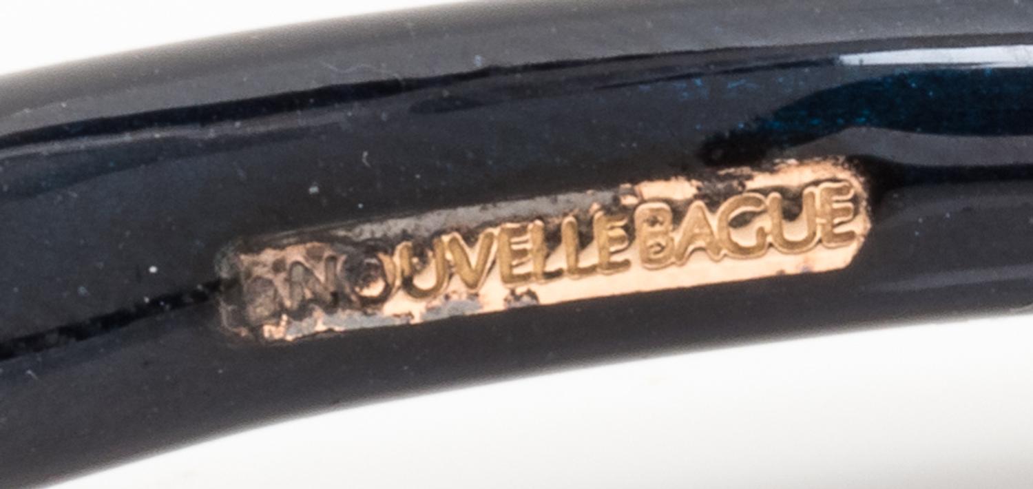 An 18 Karat Yellow Gold, Sterling Silver, and Enamel Bangle Bracelet, La Nouvelle Bague,