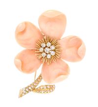 An 18 Karat, Coral and Diamond "Rose de Noel" Brooch, Van Cleef & Arpels, Paris, 16.00 dwts.