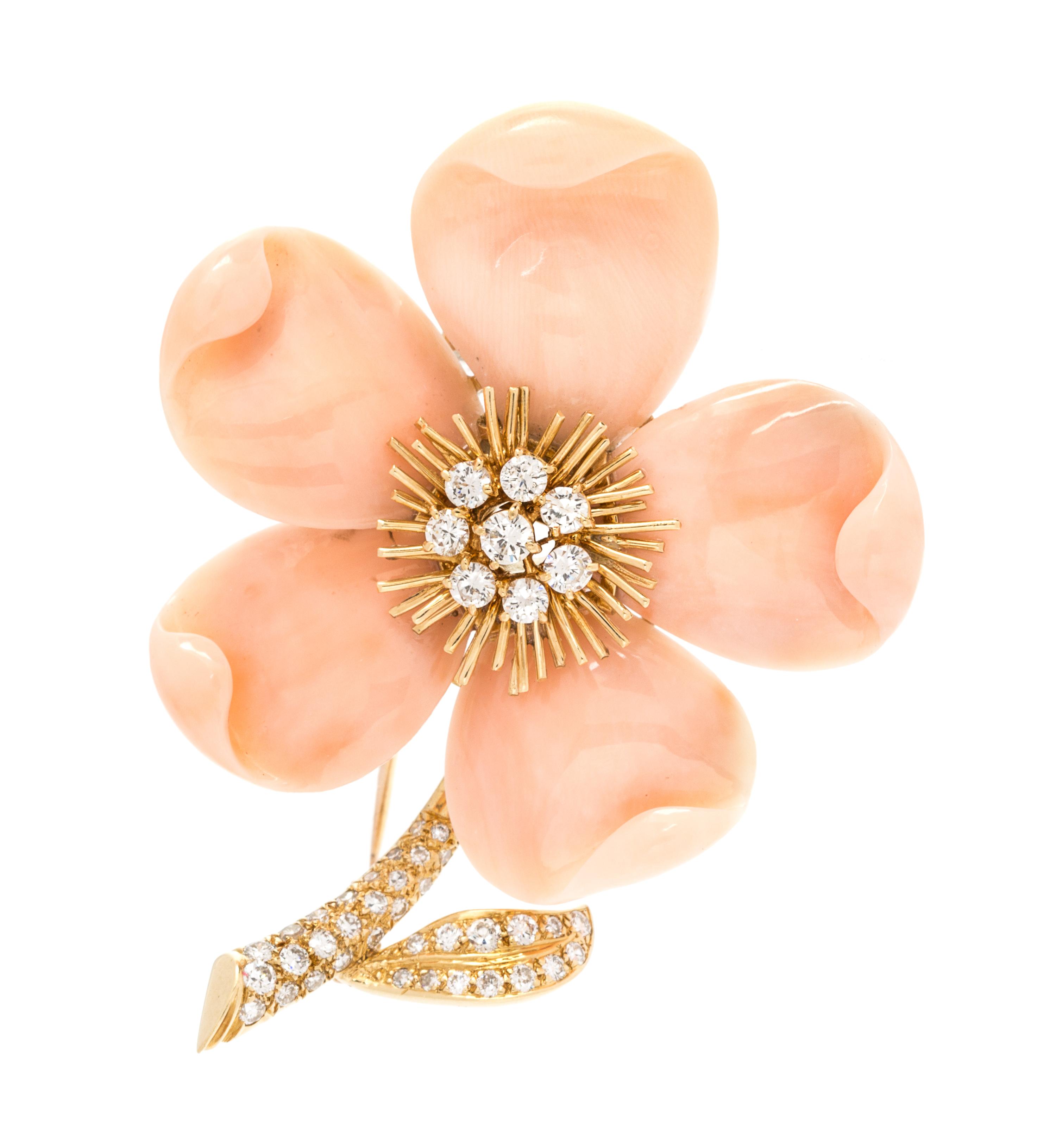 An 18 Karat, Coral and Diamond "Rose de Noel" Brooch, Van Cleef & Arpels, Paris, 16.00 dwts.