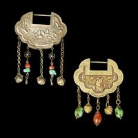 A Chinese Silver Necklace and Eight Chinese Silver Ruyi Lock-Form Pendants, Qing Dynasty 清 銀項圈一及銀如意頭形長命鎖一組八件