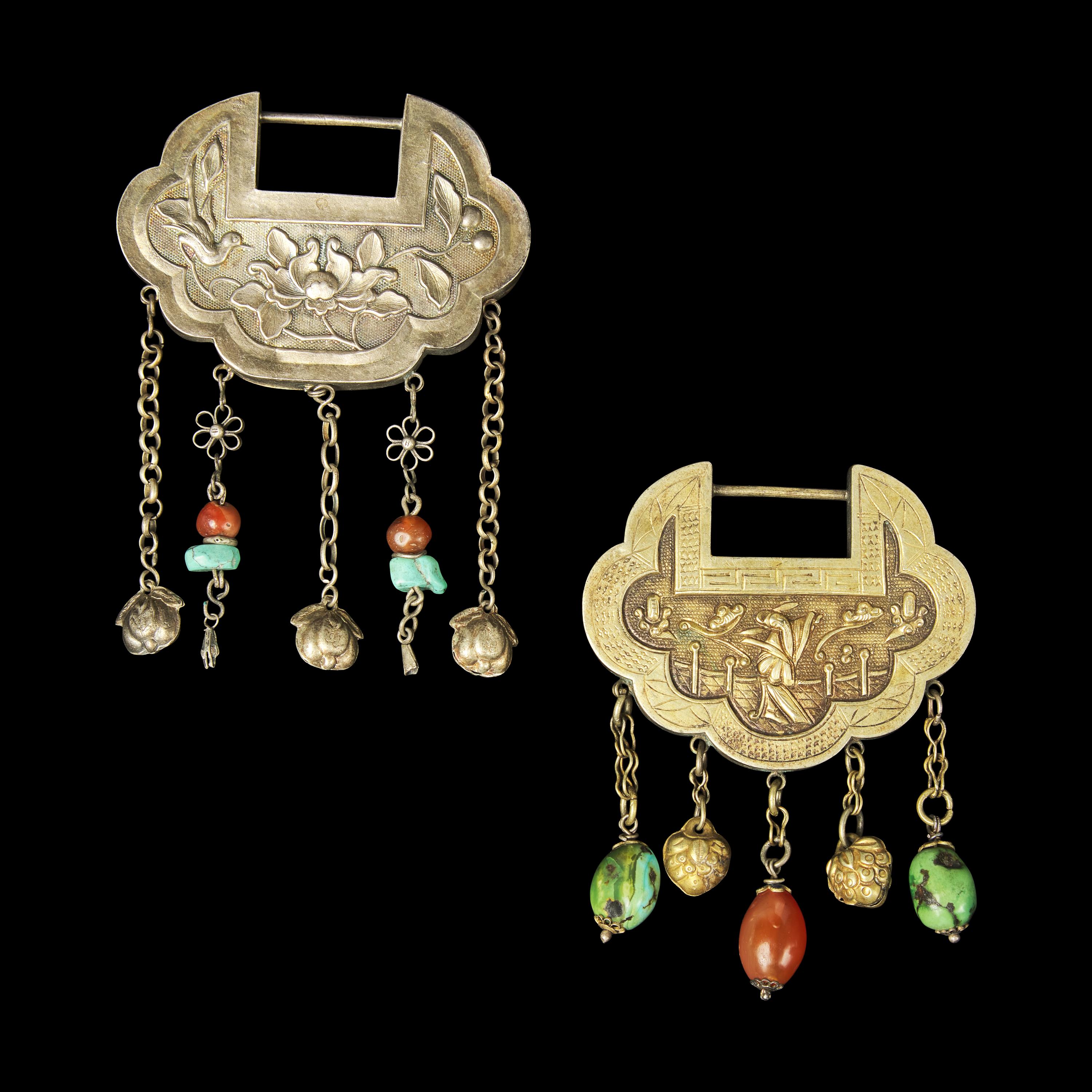 A Chinese Silver Necklace and Eight Chinese Silver Ruyi Lock-Form Pendants, Qing Dynasty 清 銀項圈一及銀如意頭形長命鎖一組八件