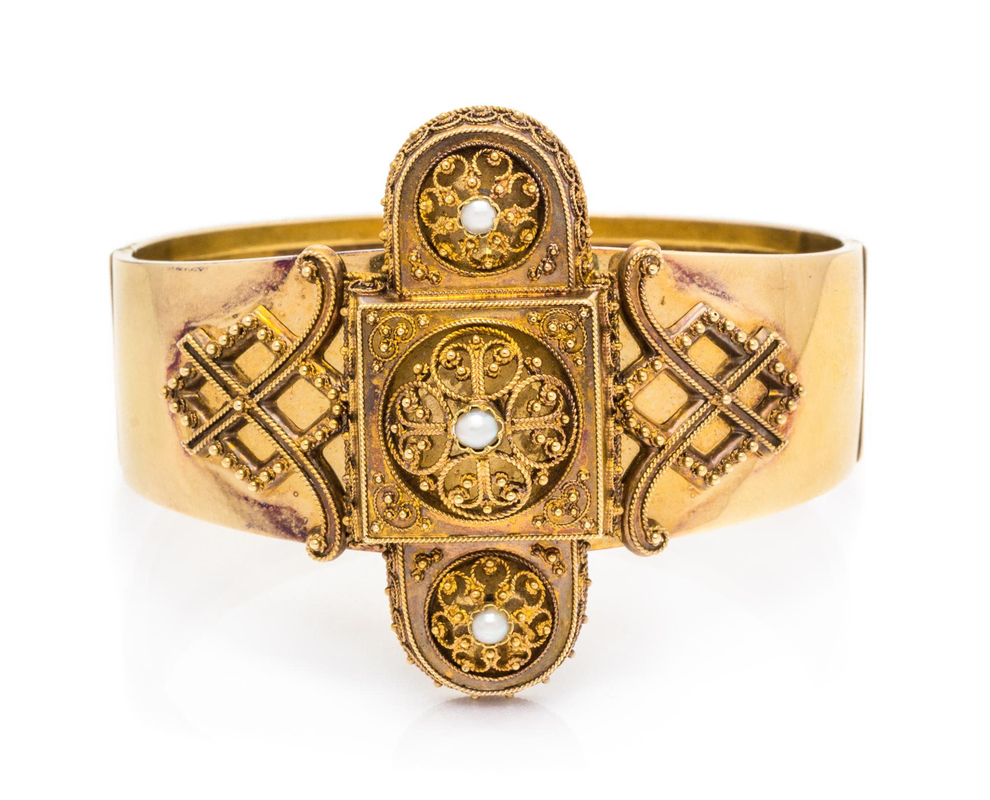 An Etruscan Revival 18 Karat Yellow Gold and Split Pearl Bangle Bracelet, Gustav Dahlgren & Co, Circa 1875, 18.70 dwts.