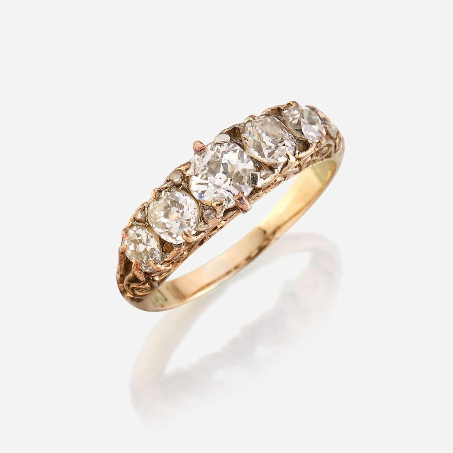 An antique diamond and eighteen karat gold ring
