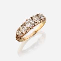 An antique diamond and eighteen karat gold ring