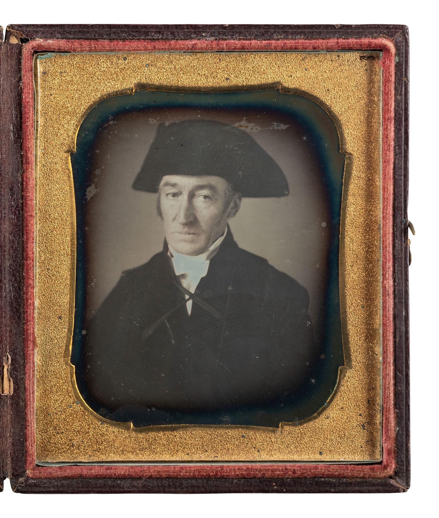[EARLY PHOTOGRAPHY]. Sixth plate daguerreotype of an aged gentleman wearing a tricorn hat.