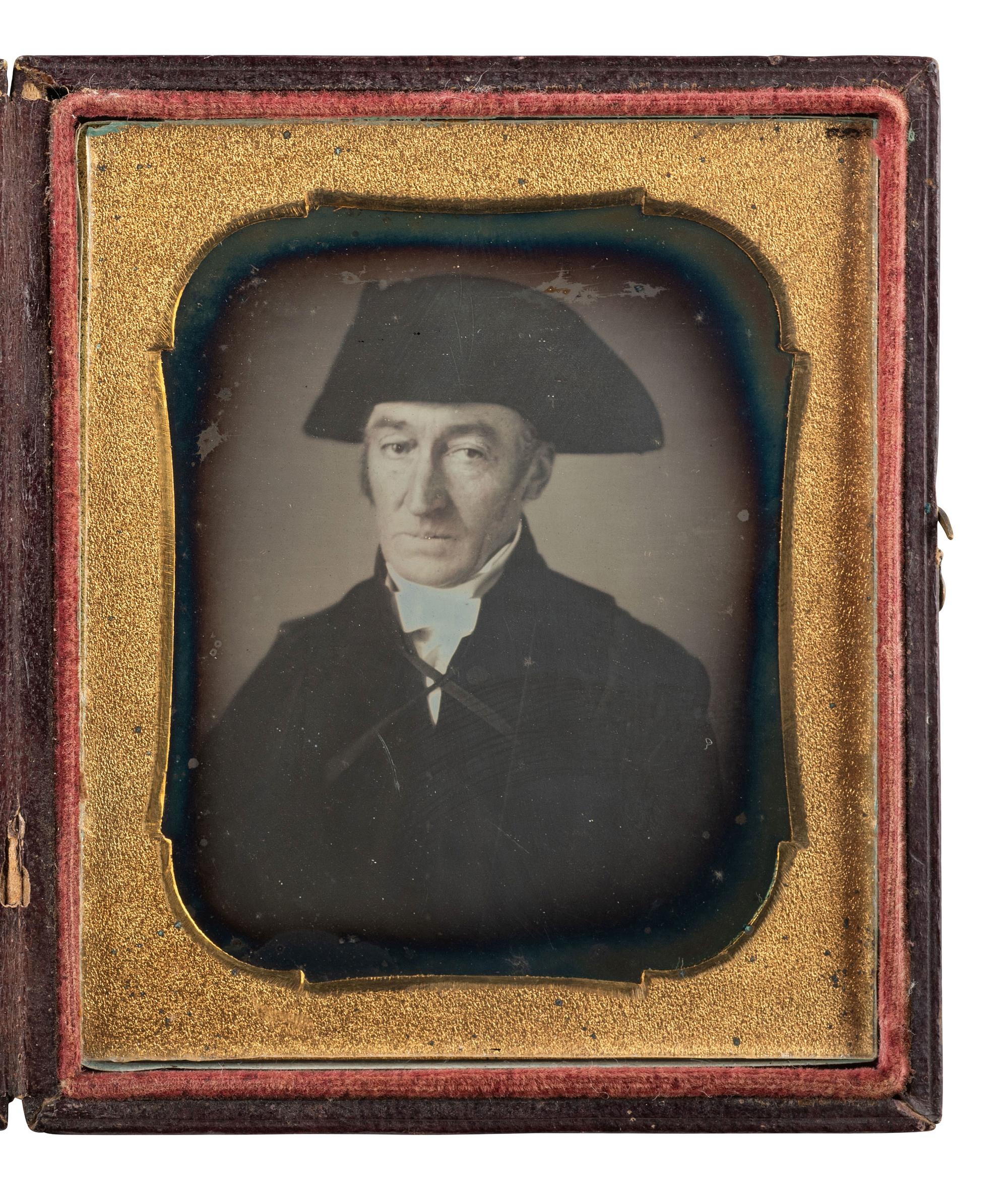 [EARLY PHOTOGRAPHY]. Sixth plate daguerreotype of an aged gentleman wearing a tricorn hat.