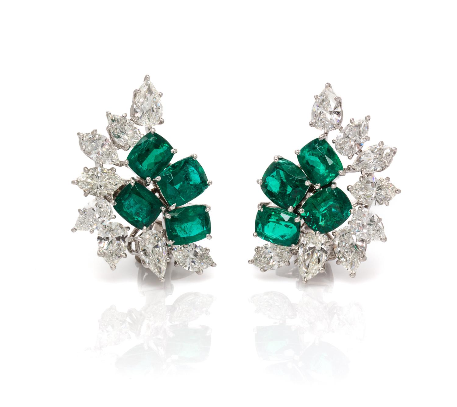 A Pair of Platinum, Emerald and Diamond Earclips, 10.40 dwts.