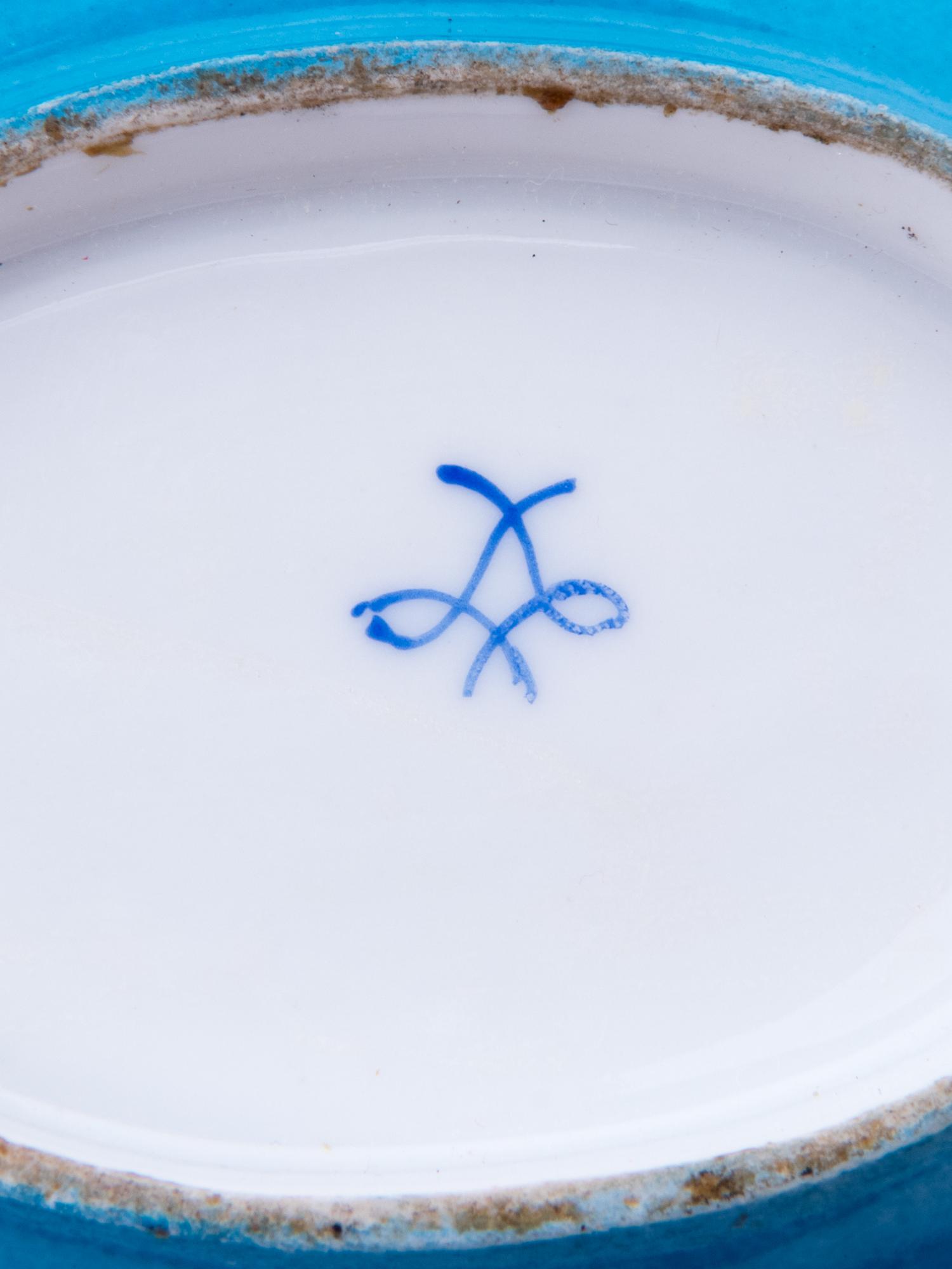Eight Sèvres Style Painted and Parcel Gilt Porcelain Articles
