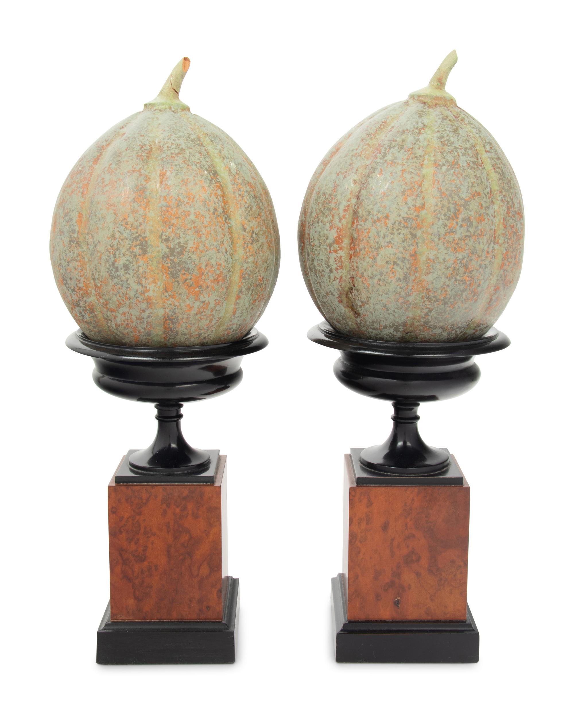 A Pair of Continental Maple Veneered and Parcel Ebonized Urns