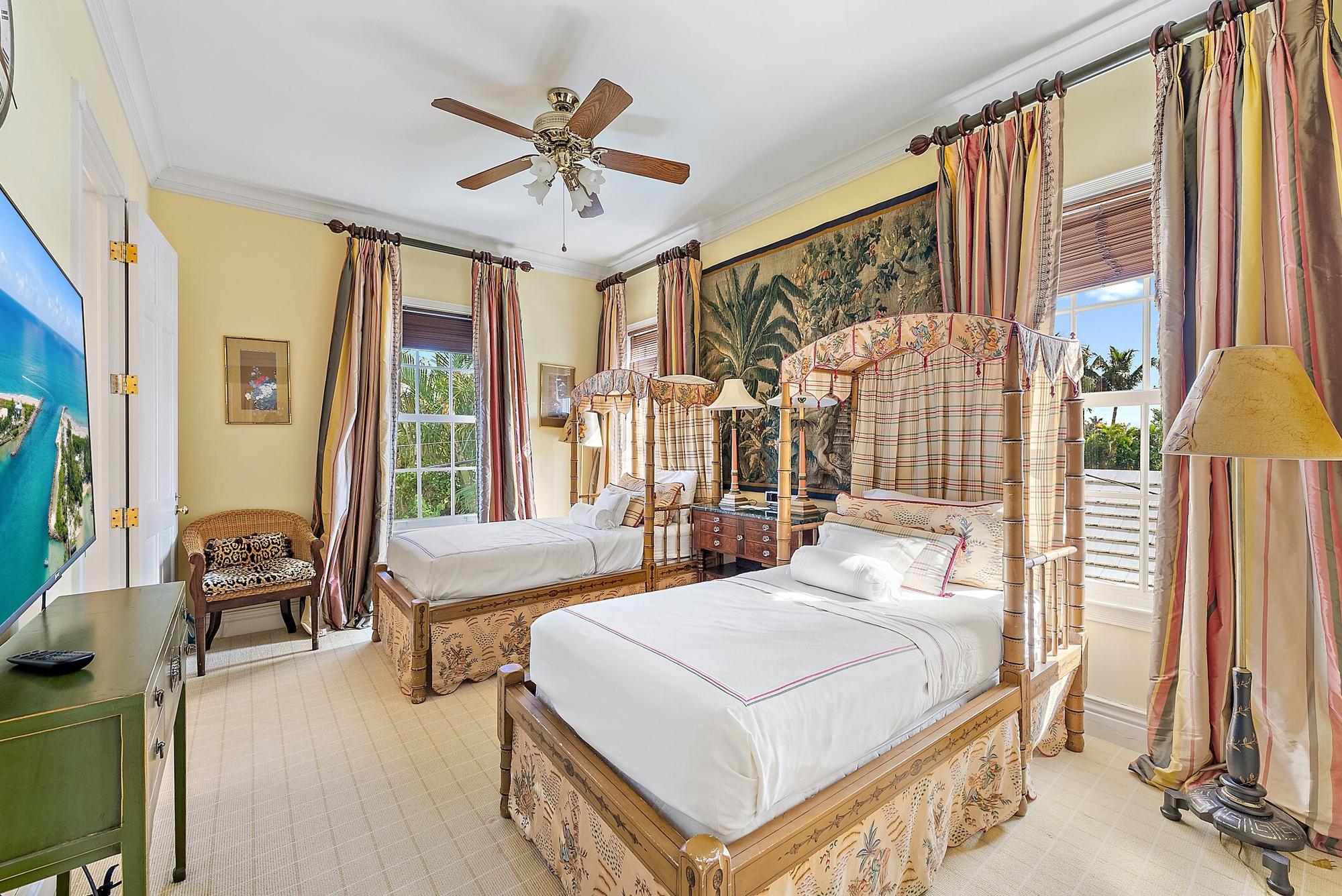 A Pair of Chinese Chippendale Style Faux Bois Giltwood Mirrors