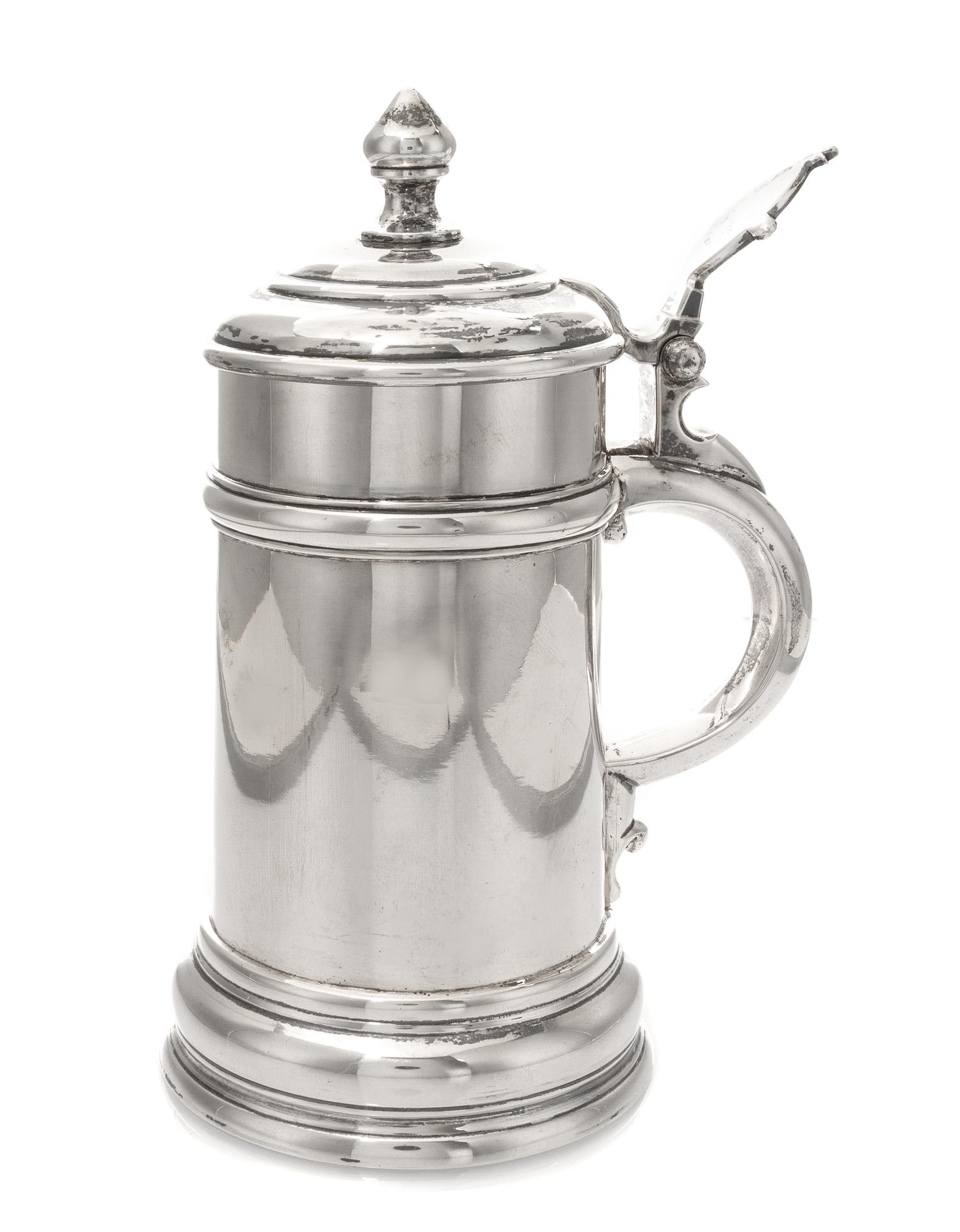 A Russian Silver Tankard, Maker's mark XK, Moscow, 1897, of cylindrical form with a baluster finial and a stepped foot.