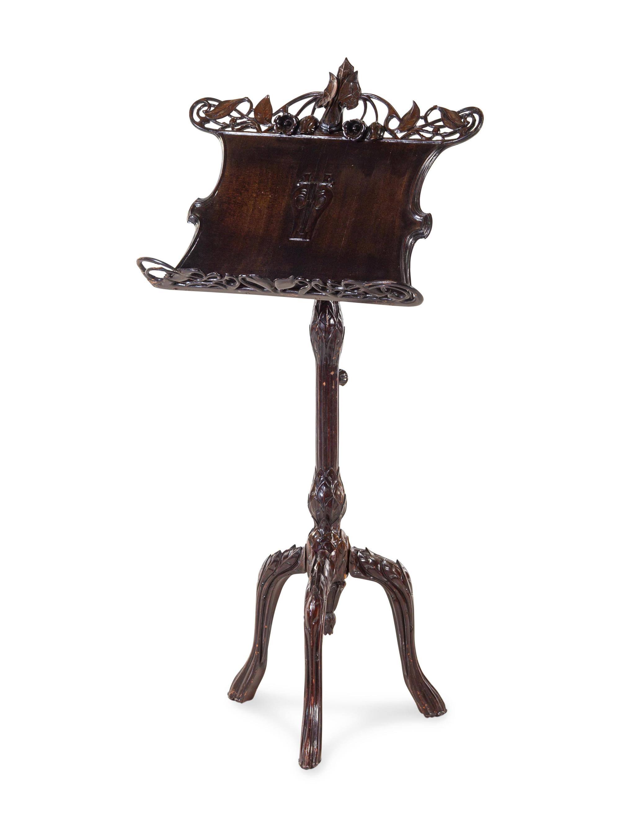 An Art Nouveau Style Carved Music Stand