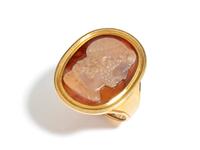 A Neoclassical Gold and Sardonyx Cameo Finger Ring with the Head of the God Zeus