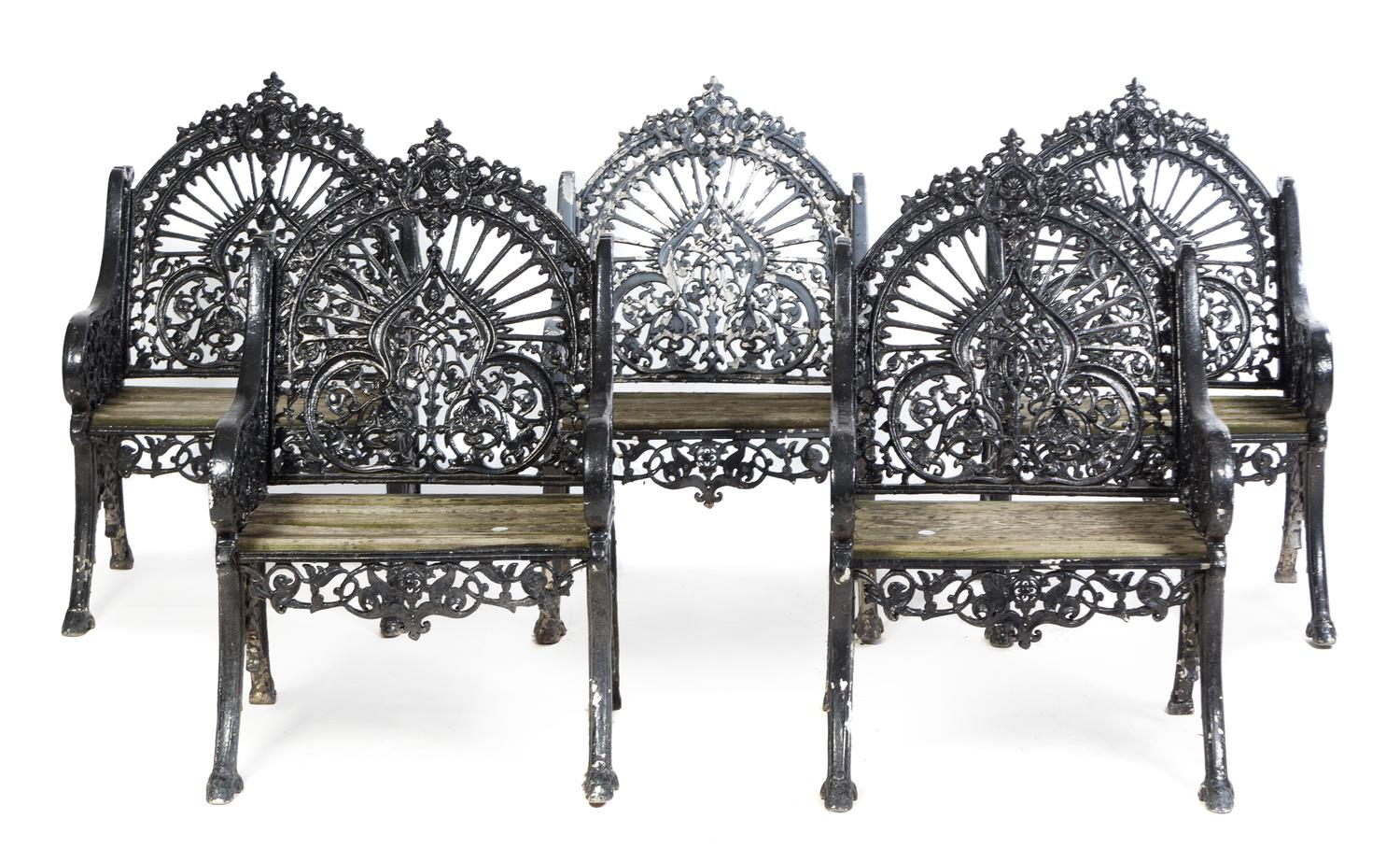 A Set of Five Victorian Painted Iron Garden Chairs Height 37 1/2 x width 23 x depth 27 inches.