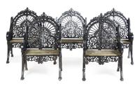 A Set of Five Victorian Painted Iron Garden Chairs Height 37 1/2 x width 23 x depth 27 inches.