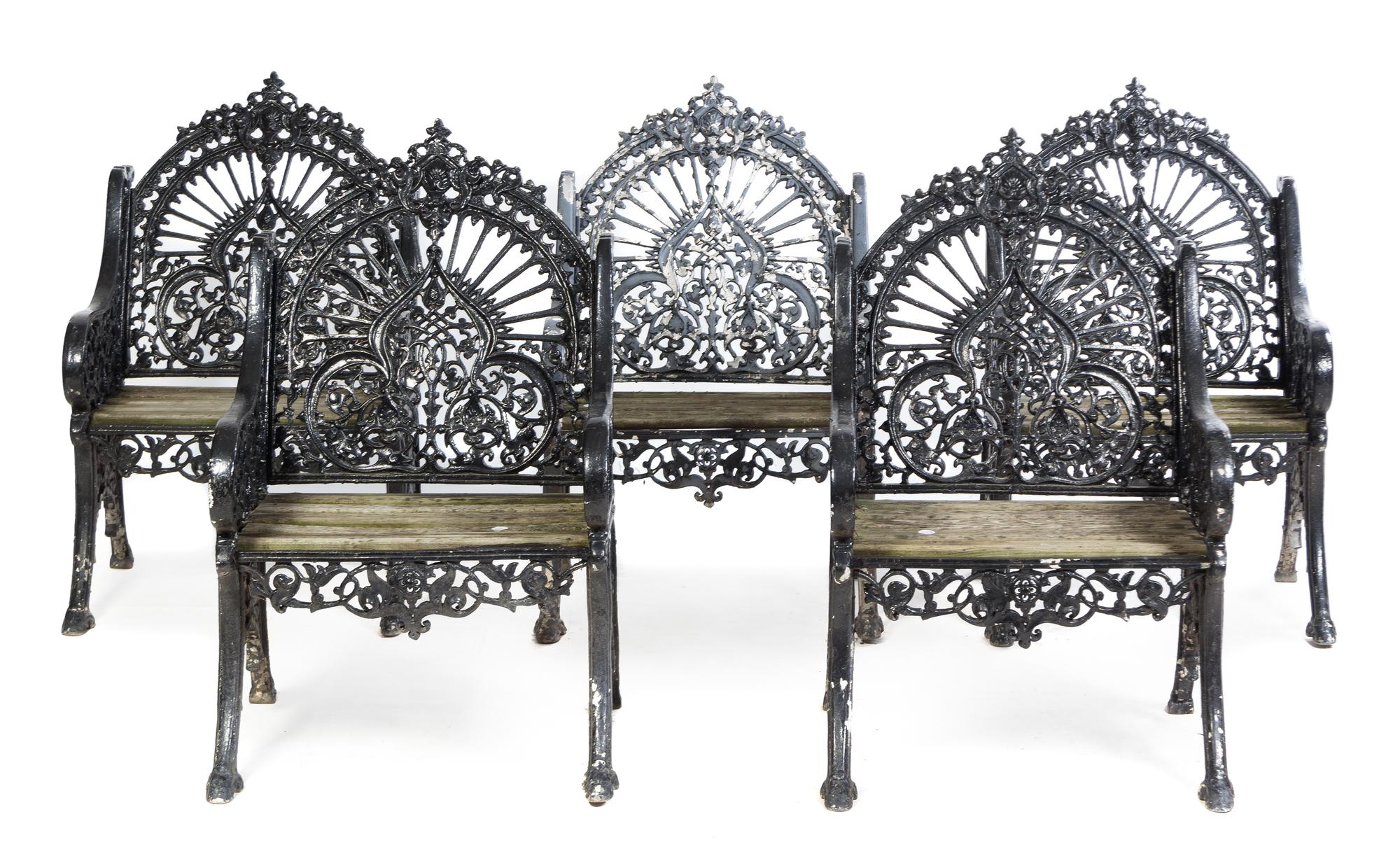 A Set of Five Victorian Painted Iron Garden Chairs Height 37 1/2 x width 23 x depth 27 inches.