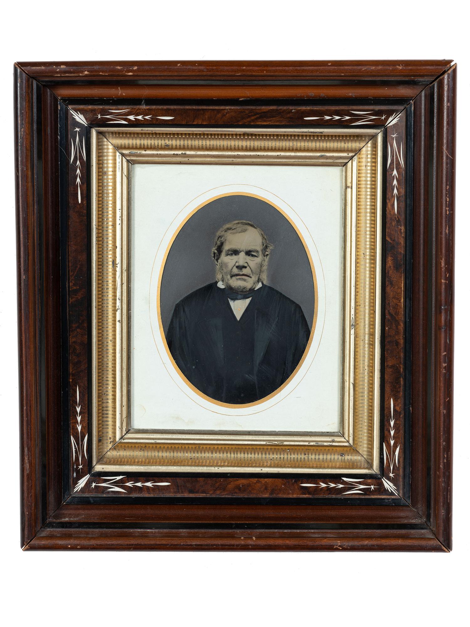 [EARLY PHOTOGRAPHY]. Albumen photograph of African American woman and tintype of white man found together in Louisiana. Ca mid 19th century.