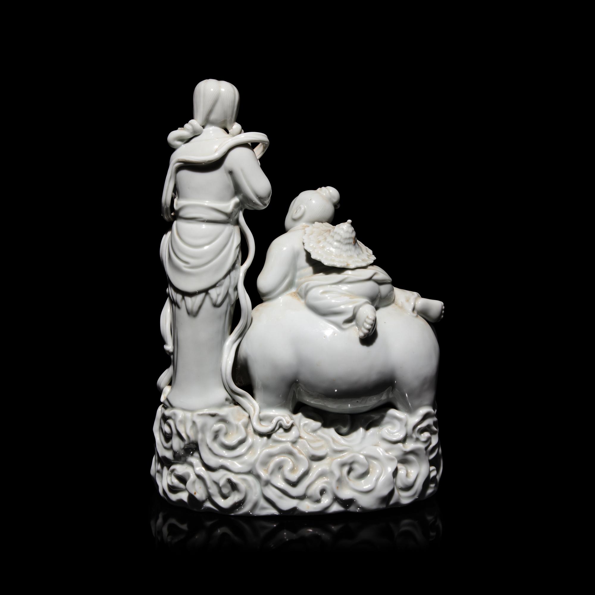 A Chinese Blanc de Chine Figural Group of the Weaver Girl and Herd Boy