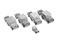 A Set of Four German Vehicle-Form Metal Cigarette Box, Lighter and Ashtray Sets
