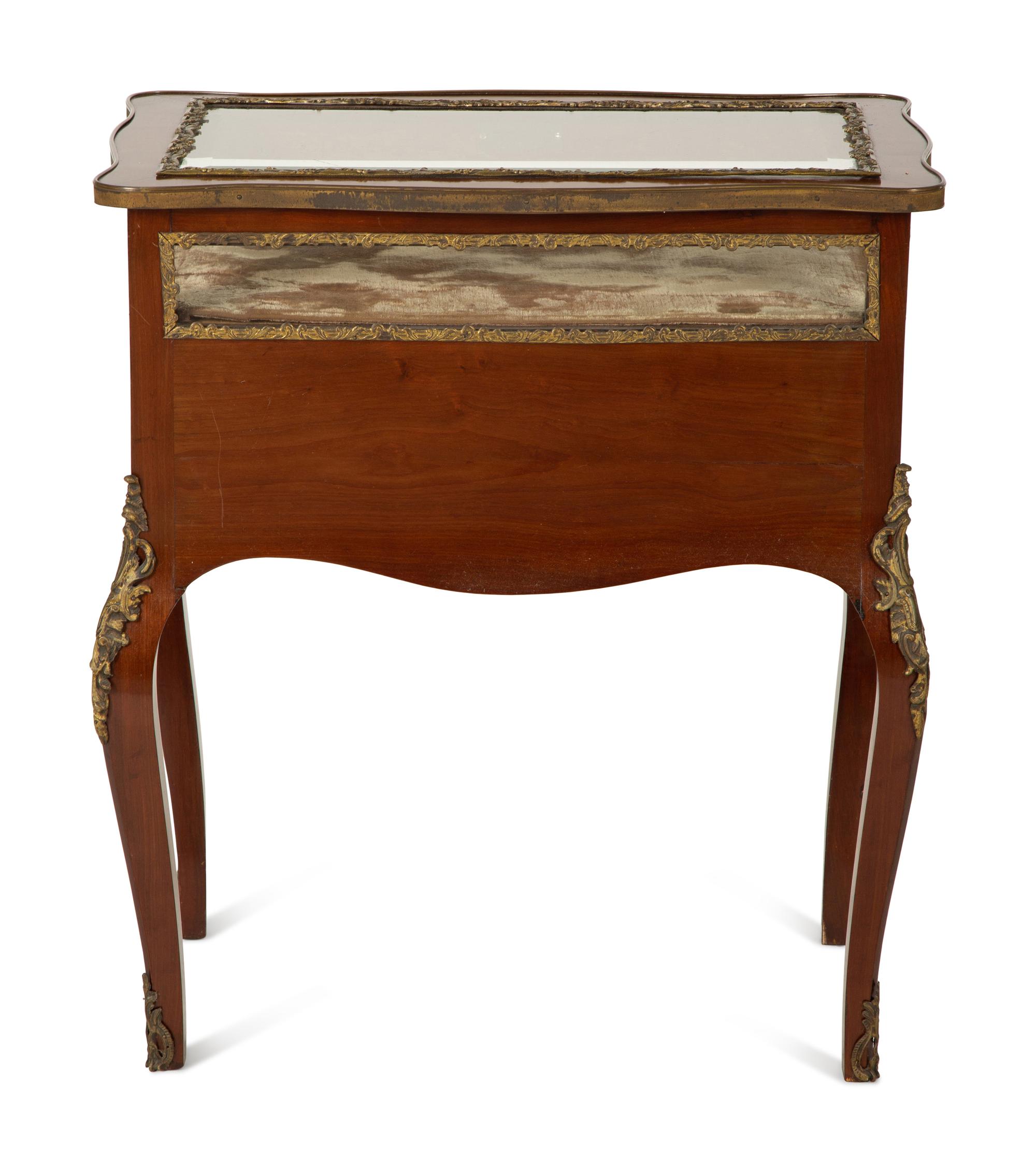 A Louis XV Style Gilt Bronze Mounted Mahogany Vitrine Table