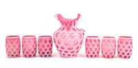 A Cranberry Coin Dot Drink Set Height of pitcher 8 1/2 inches.