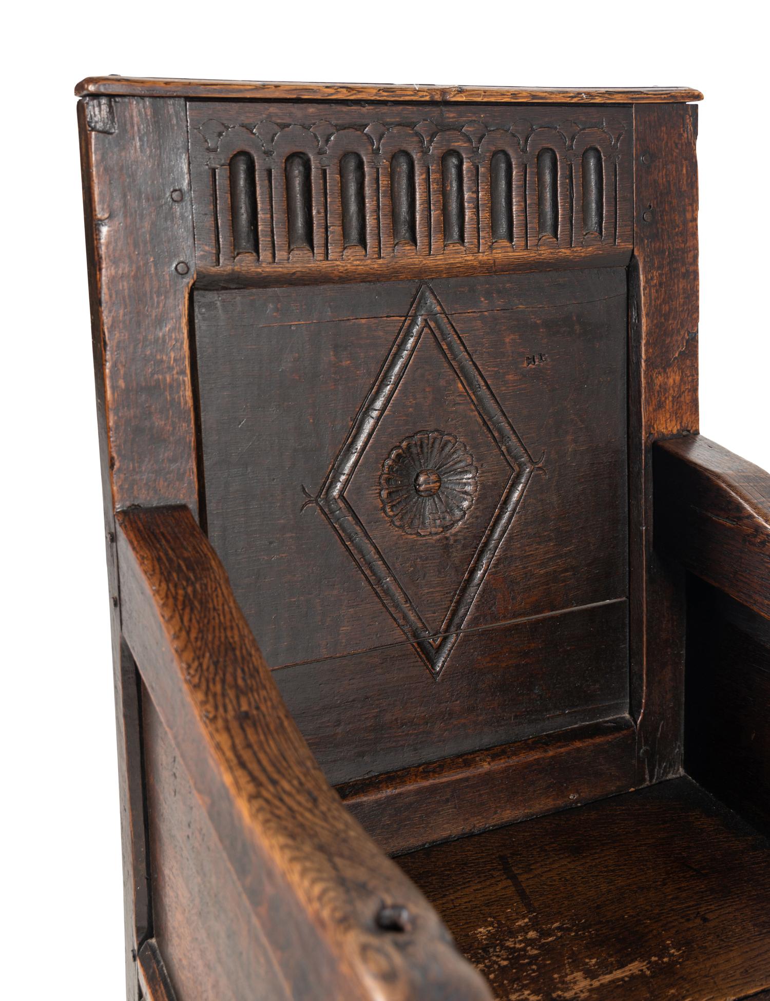 A Charles II Oak Armchair