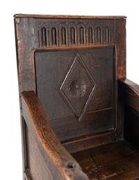 A Charles II Oak Armchair