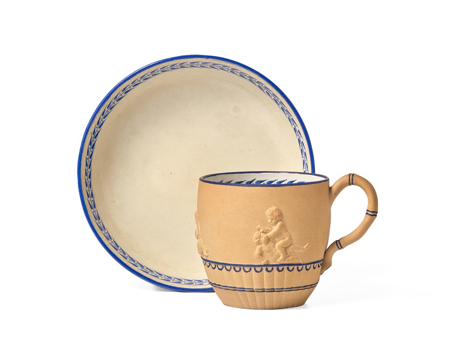 A Wedgwood Caneware Teacup and Saucer