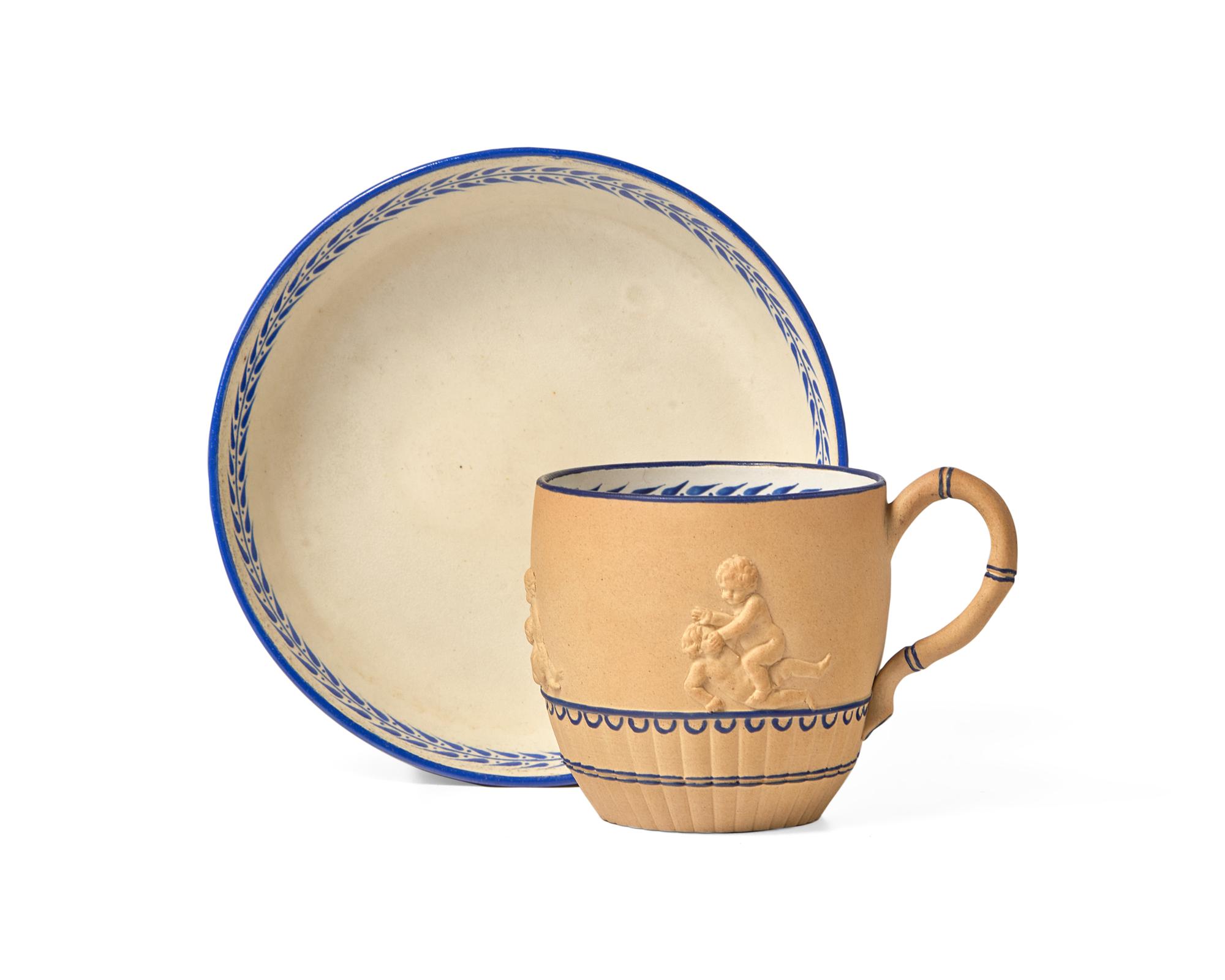 A Wedgwood Caneware Teacup and Saucer